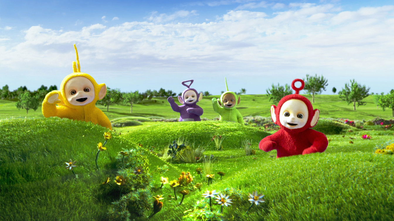 Teletubbies (L to R) Rebecca Hyland as Laa-Laa, Jeremiah Krage as Tinky-Winky, Nick Kellington as Dipsy and Rachelle Beinart as Po in Teletubbies. Cr. COURTESY OF NETFLIX © 2022 Teletubbies Netflix 2022 c COURTESY OF NETFLIX