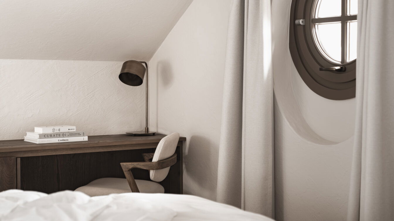 Suite mit Bett, Schreibtisch und Fenster im Hotel stieg'nhaus