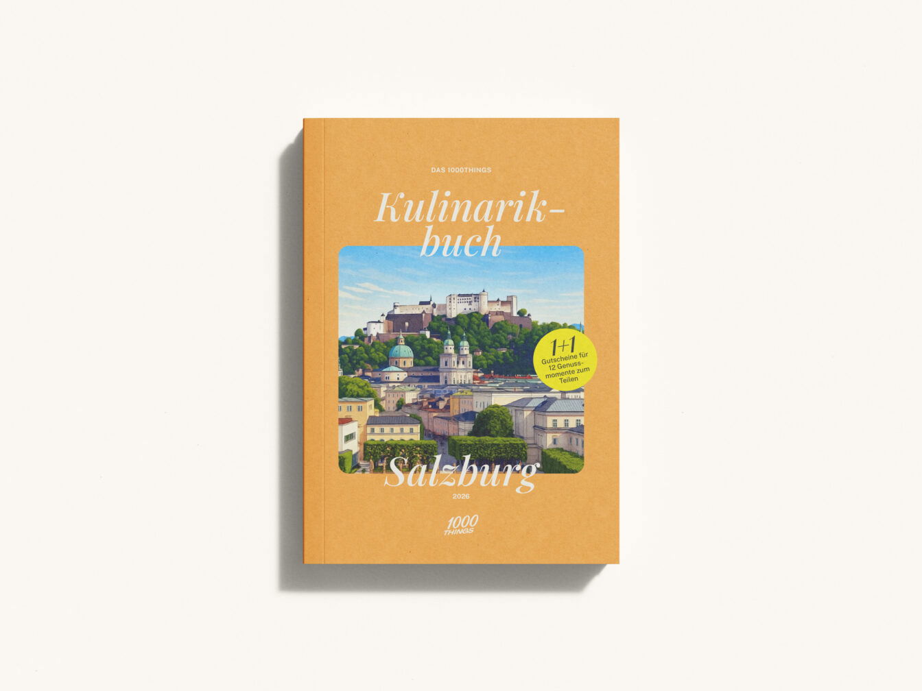 Mockup des 1000things Kulinarikbuchs: Salzburg 2026