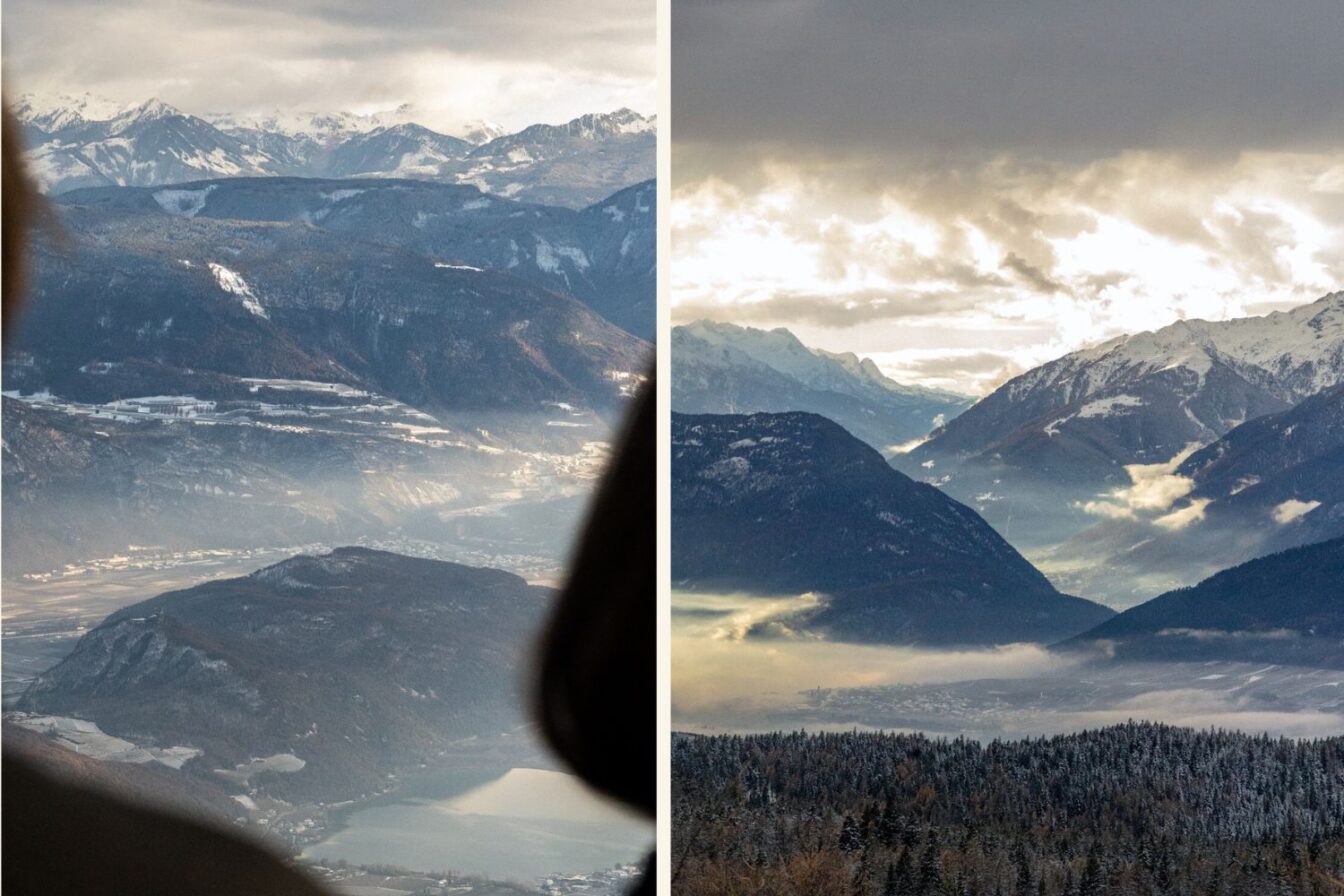 Blick aus großer Höhe auf ein Tal mit einem See und umliegenden Hügeln; dahinter mehrschichtige Bergketten mit Schnee, teils in diffusem Licht und Nebel.
Bild 1 (rechts)
Weite Berglandschaft mit mehreren schneebedeckten Gipfeln, dunklen Bergrücken im Vordergrund, aufsteigendem Nebel im Tal und dramatisch bewölktem Himmel.